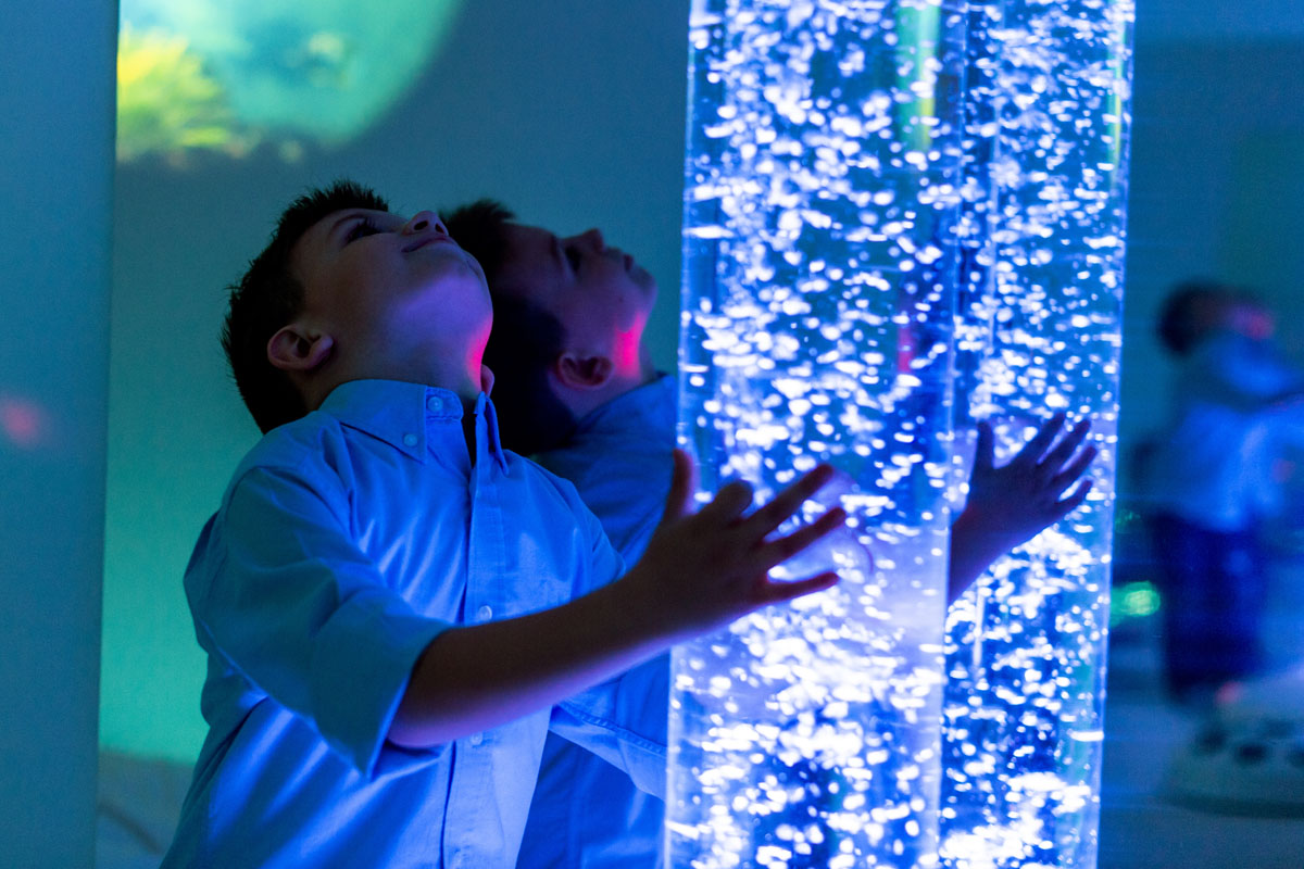 Child in therapy sensory stimulating room